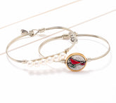 Luca & Danni Silvertone Set of 2 Inspirational Cardinal Bangles 7-1/2"