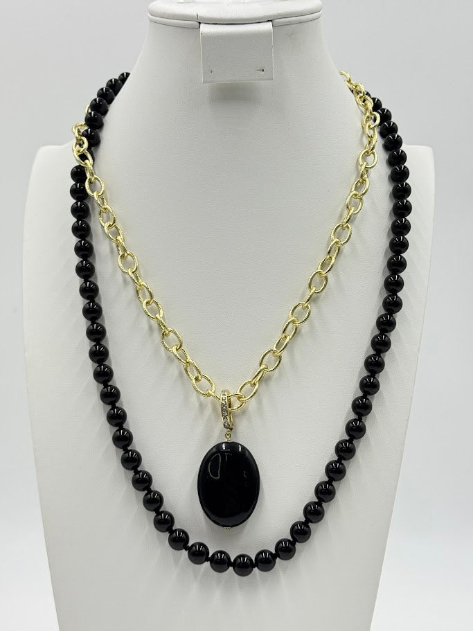 Heidi  "Loop Back Around" Black Transformable Charms Necklace. 52"