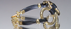 RFM "Di Classe" Goldtone Circle Station Bracelet, Adjustable
