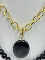 Heidi  "Loop Back Around" Black Transformable Charms Necklace. 52"