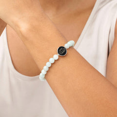 Jade of Yesteryear Sterling Silver Green Jade Bead Lotus Charm Stretch Bracelet. S/M