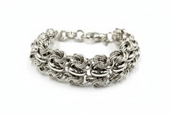 Bronzo Italia Silvertone Polished Woven Love Knot Bracelet 7-1/4"