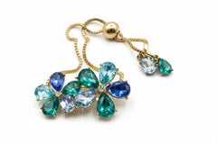Isaac Mizrahi Live! Goldtone Adjustable Blue Crystal Flower Bracelet.