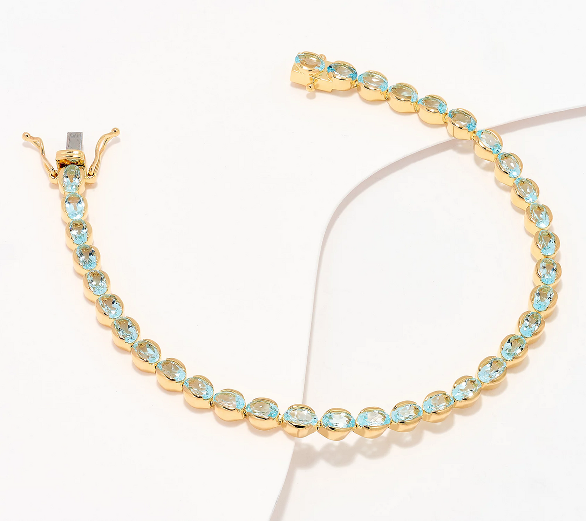 Affinity Gems Oval Cut Blue Topaz 14K Plated Sterling Tennis Bracelet, Avg